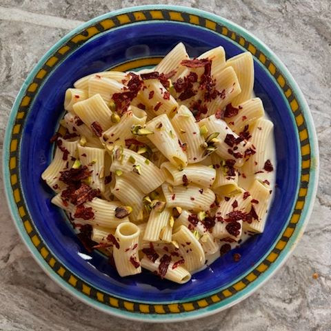 Mezzi Rigatoni with Fonduta, Peperoni Cruschi and Pistachio